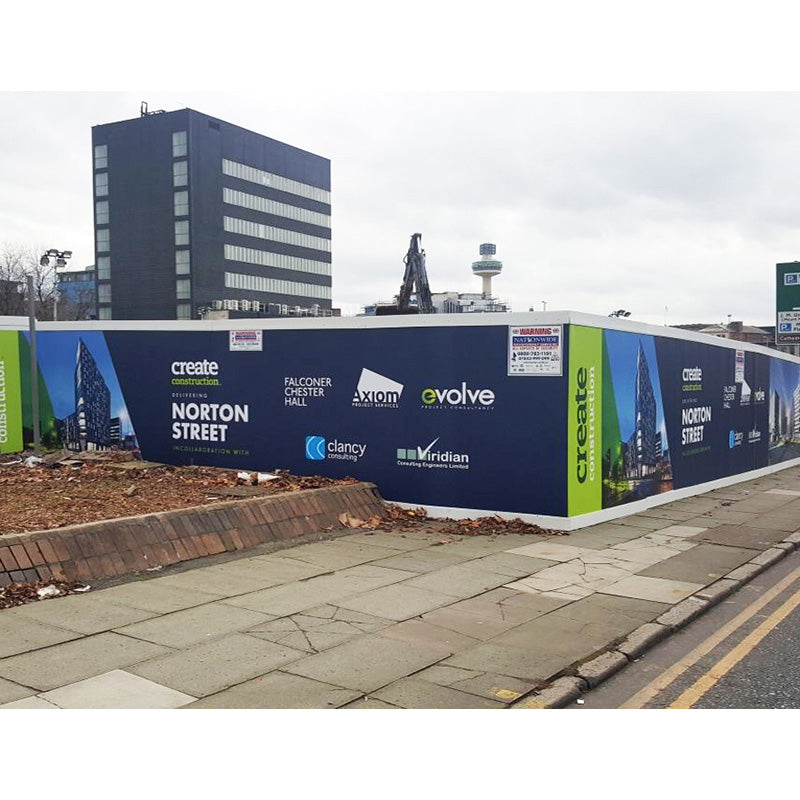 Hoarding graphics by Artsoft Expo Solutions Inc. featuring colorful, custom-designed signage for construction site privacy and branding.