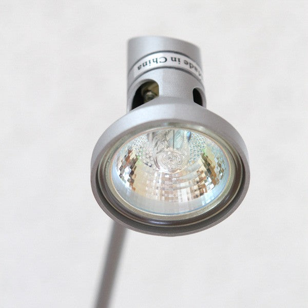 Halogen light for retractable banner stand by Artsoft Expo Solutions Inc., showing the spotlight and support arm in use.