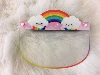 Kids face shield from Artsoft Expo Solutions Inc. Weather Collection, featuring a colorful rainbow design on the front.