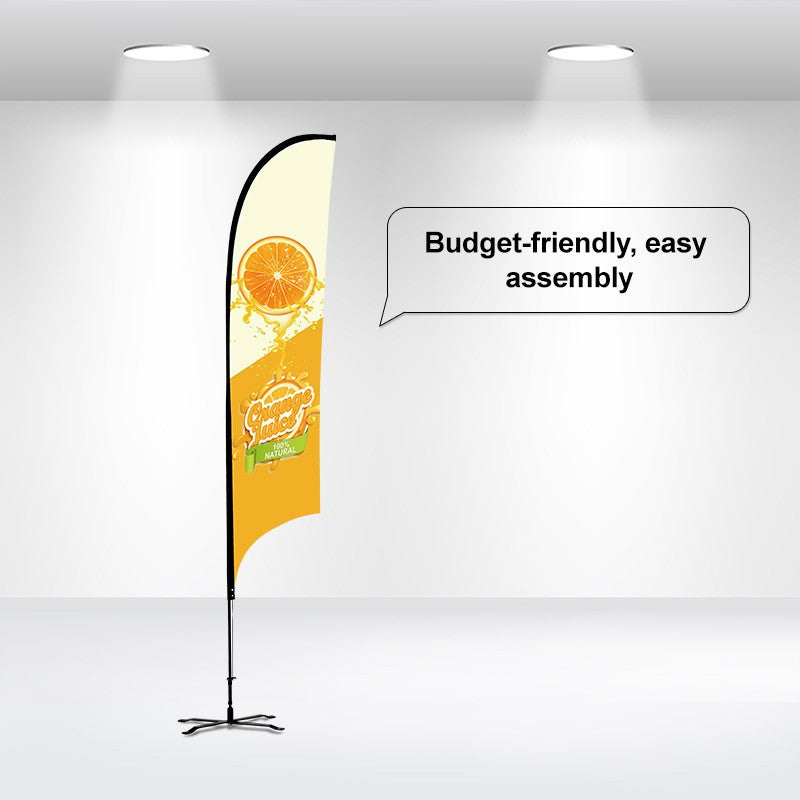 A promotional flag banner set up indoors, featuring a yellow and black flag with a custom printed design, mounted on a pole with a cross base and ground stake.