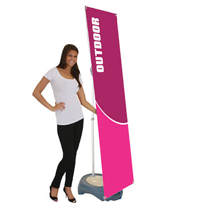 Outdoor banner stand by Artsoft Expo Solutions Inc. showcasing a tall, adjustable promotional display on a grassy outdoor setting.