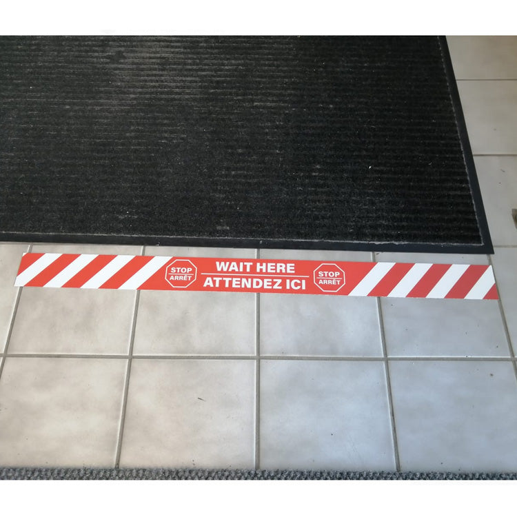 Artsoft Expo 32x2.5 inch floor sticker with STOP / WAIT HERE message, designed for clear visual instructions on floors.