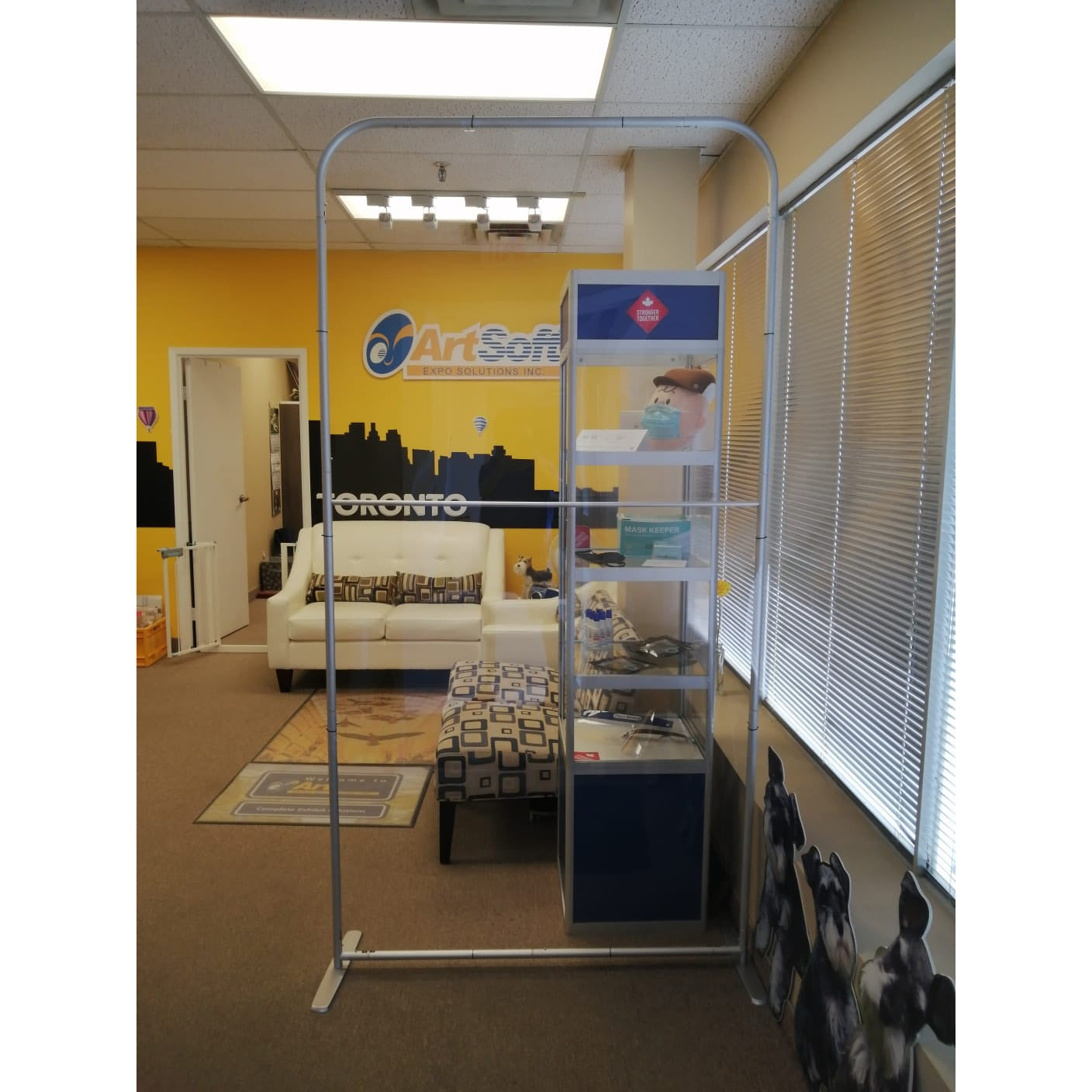 Portable Protective Screen II by Artsoft Expo Solutions Inc., clear plastic shield on a stand for safety and social distancing.
