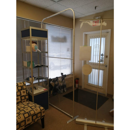 Portable Protective Screen II by Artsoft Expo Solutions Inc., clear plastic barrier with metal frame for safety and social distancing.