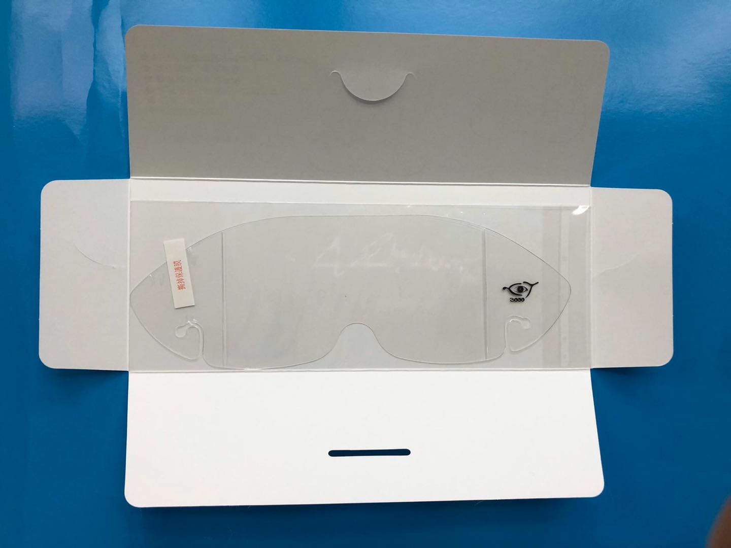 Protective Eye Mask 3000 by Artsoft Expo Solutions Inc. for personal protective equipment, shown in blue with adjustable straps.