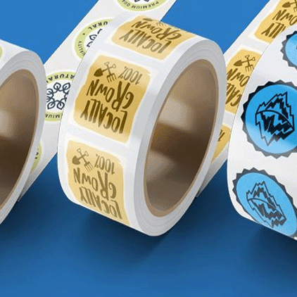 Round paper roll label with circle shape from Artsoft Expo Solutions Inc., featuring a white background and label design.
