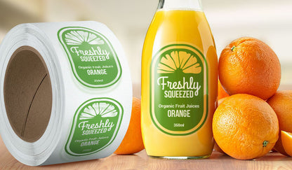 Clear poly roll labels with rounded rectangle and oval shapes, ideal for food product packaging by Artsoft Expo Solutions Inc.